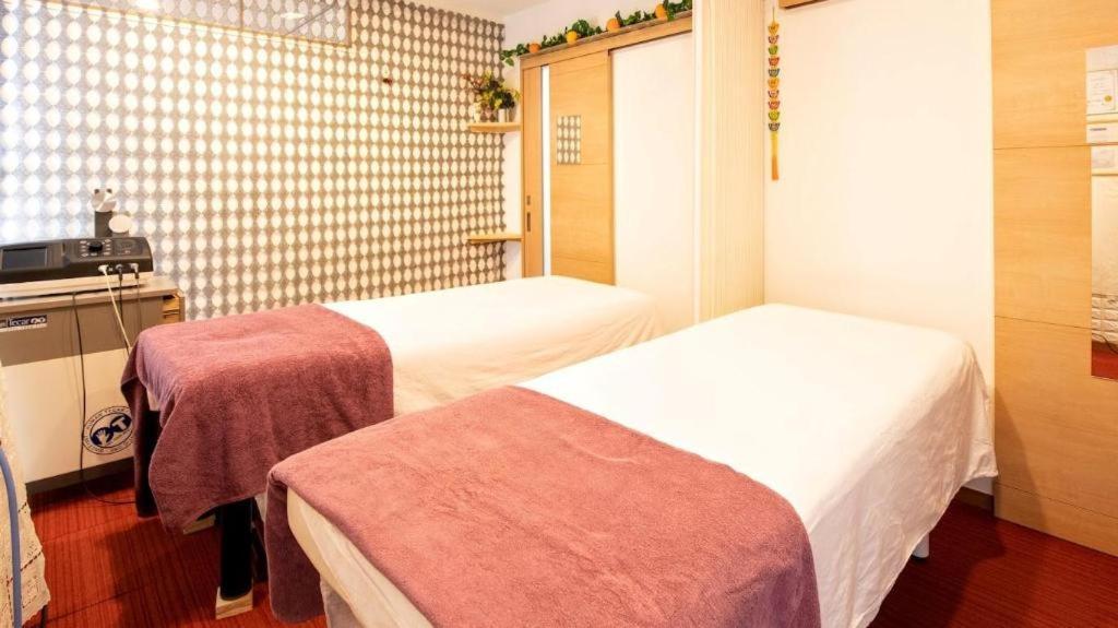 Ou Hotel Йонаґо Екстер'єр фото